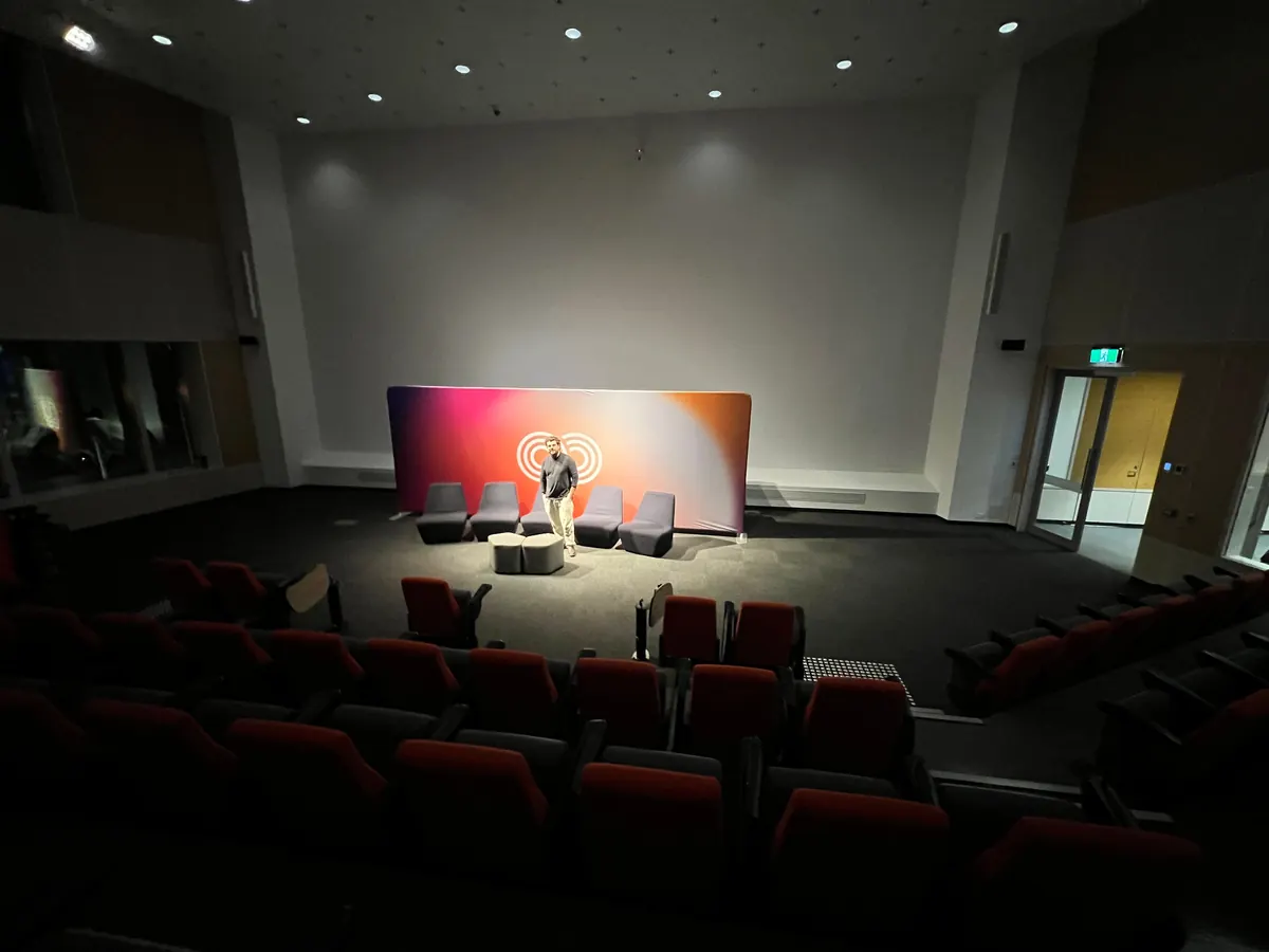 Speaker presenting at Autistic Pride Day 2025